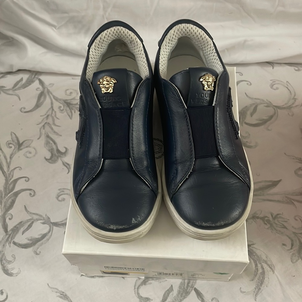 Navy blue young Versace shoes.